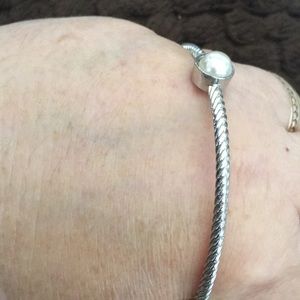 Thin silver tone bangle bracelet